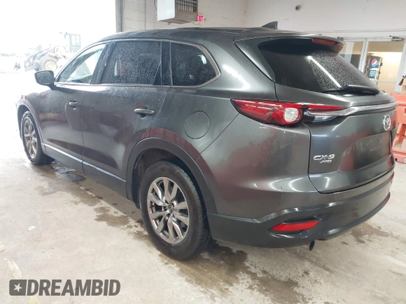 2017 Mazda CX-9 Touring with VIN JM3TCBCY1H0127229, listed as a IAAI auction lot 42320263 with 85,890 mi miles and . Bid and sale history available at DreamBid. Image 3.