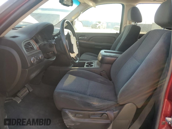 2007 GMC Yukon SLT with VIN 1GKFK13037J101824, listed as a Copart auction lot 77865294 with 179,884 mi miles and Salvage Title. Bid and sale history available at DreamBid. Image 7.