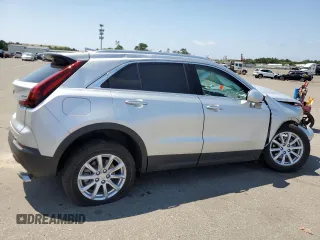2022 Cadillac XT4 AWD Luxury with VIN 1GYFZBR45NF118075, listed as a Copart auction lot 58654423 with 1,982 mi miles and . Bid and sale history available at carsss.com. Image 3.