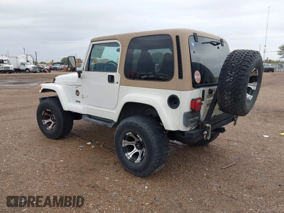 2001 Jeep Wrangler Sahara with VIN 1J4FA59S71P365271, listed as a IAAI auction lot 41889948 with 144,357 mi miles. Bid and sale history available at carsss.com. Image 3.
