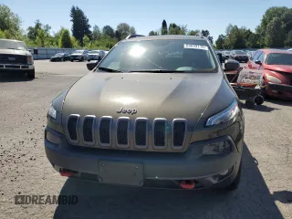 2015 Jeep Cherokee Trailhawk with VIN 1C4PJMBS8FW513391, listed as a Copart auction lot 64633115 with 115,406 mi miles and Clean title. Bid and sale history available at DreamBid. Image 5.