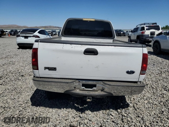 2001 Ford F-150 XL with VIN 1FTZX17251NB12930, listed as a Copart auction lot 62517295 with Not provided miles and Salvage title. Bid and sale history available at DreamBid. Image 6.