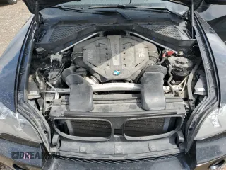 2012 BMW X5 50i with VIN 5UXZV8C51CL424965, listed as a Copart auction lot 64414455 with 121,894 mi miles and Clean title. Bid and sale history available at DreamBid. Image 12.