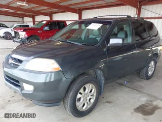 2003 Acura MDX Touring Pkg RES w/Navigation System with VIN 2HNYD18993H555930, listed as a IAAI auction lot 41844355 with 145,100 mi miles. Bid and sale history available at carsss.com. Image 2.