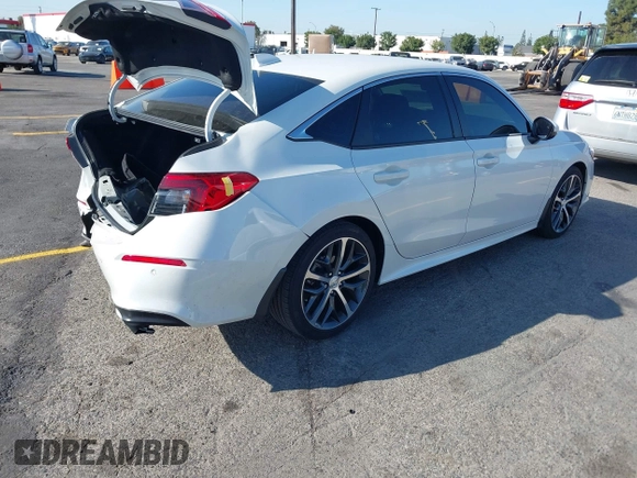 2024 Honda Civic Touring z VIN 2HGFE1F93RH303145, wystawiony jako IAAI lot #41975369 z przebiegiem 32 644 mil mil oraz . Historia ofert i sprzedaży dostępna na DreamBid. Obrazek 4.