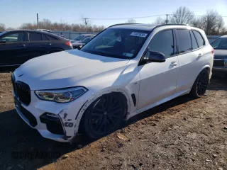 2021 BMW X5 M50i with VIN 5UXJU4C08M9E19423, listed as a Copart auction lot 71487632 with 22,466 mi miles. Bid and sale history available at carsss.com. Image 1.