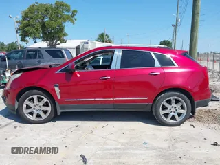 2012 Cadillac SRX Performance Collection with VIN 3GYFNBE36CS544861, listed as a IAAI auction lot 42330288 with 172,335 mi miles and . Bid and sale history available at DreamBid. Image 14.