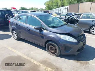 2012 Ford Fiesta S z VIN 3FADP4AJ9CM187385, wystawiony jako IAAI lot #42628794 z przebiegiem 102 929 mil mil oraz . Historia ofert i sprzedaży dostępna na DreamBid. Obrazek 1.
