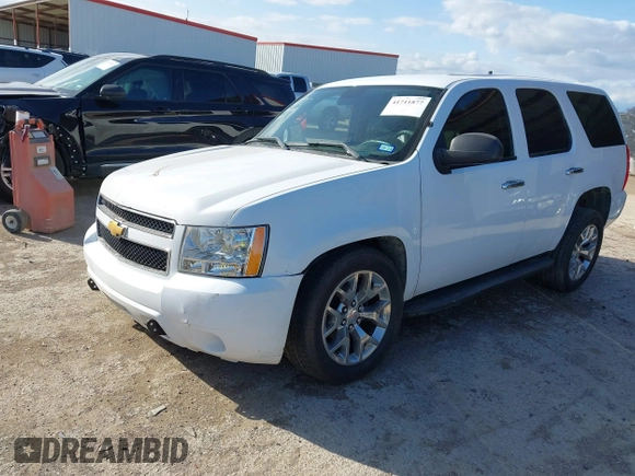 2013 Chevrolet Tahoe Commercial with VIN 1GNLC2E06DR348757, listed as a IAAI auction lot 41711877 with 163,473 mi miles and . Bid and sale history available at DreamBid. Image 17.