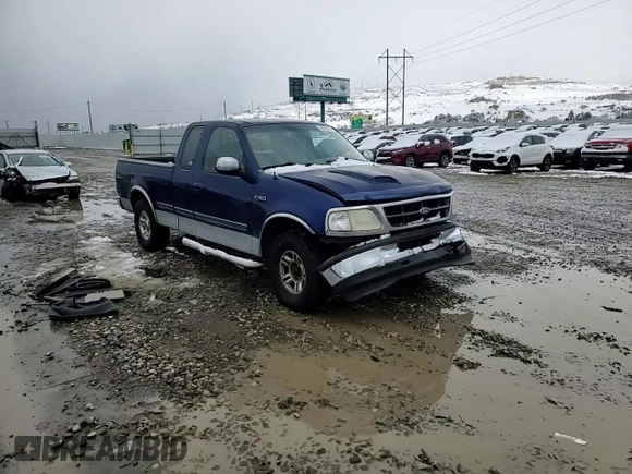 1997 Ford F-150 XL with VIN 1FTEX17LXVKB44786, listed as a Copart auction lot 49630955 with 301,736 mi miles and Salvage title. Bid and sale history available at DreamBid. Image 10.
