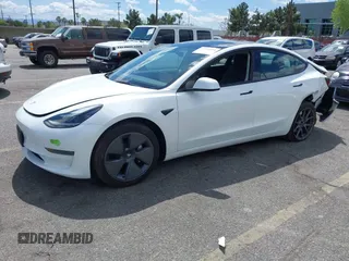 2023 Tesla Model 3 with VIN 5YJ3E1EA5PF502066, listed as a IAAI auction lot 41934960 with 17,926 mi miles and . Bid and sale history available at carsss.com. Image 2.