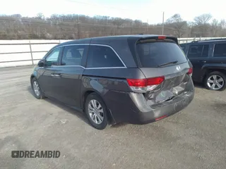 2014 Honda Odyssey EX-L with VIN 5FNRL5H64EB037646, listed as a IAAI auction lot 41786768 with 116,491 mi miles and . Bid and sale history available at carsss.com. Image 3.