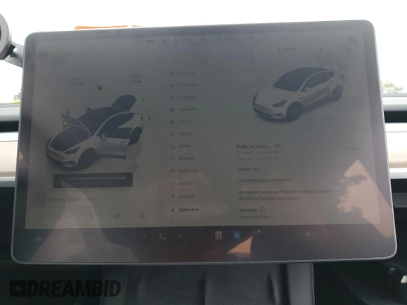 2023 Tesla Model Y Long Range with VIN 7SAYGDEEXPF744472, listed as a Copart auction lot 54109315 with 15,404 mi miles and Salvage Title. Bid and sale history available at DreamBid. Image 9.