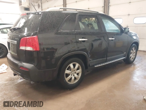 2012 Kia Sorento LX with VIN 5XYKTDA22CG283040, listed as a IAAI auction lot 41948892 with 266,330 mi miles. Bid and sale history available at carsss.com. Image 4.