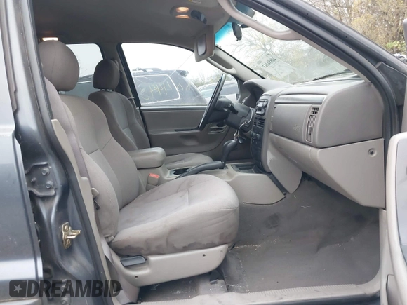 2003 Jeep Grand Cherokee Laredo with VIN 1J4GX48SX3C604904, listed as a IAAI auction lot 40884443 with 188,352 mi miles. Bid and sale history available at carsss.com. Image 5.