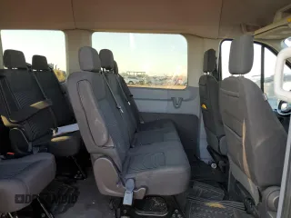 2018 Ford Transit Passenger XL with VIN 1FBVU4XG3JKA28907, listed as a Copart auction lot 69424444 with 61,411 mi miles and Salvage Title. Bid and sale history available at DreamBid. Image 11.