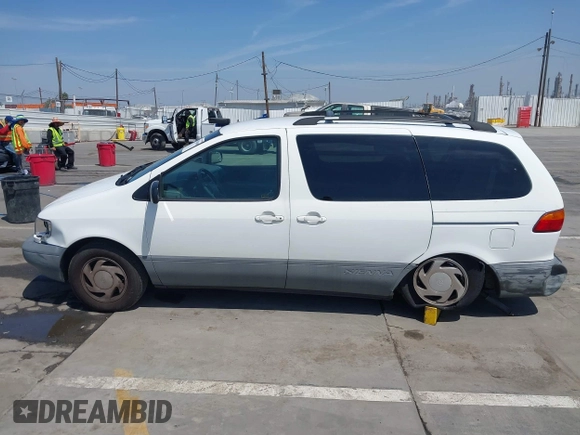 1998 Toyota Sienna LE with VIN 4T3ZF13C2WU066460, listed as a IAAI auction lot 42088006 with 169,014 mi miles and . Bid and sale history available at DreamBid. Image 14.