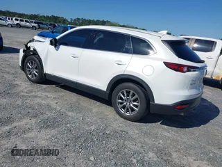 2019 Mazda CX-9 Touring z VIN JM3TCACY3K0333931, wystawiony jako IAAI lot #41968519 z przebiegiem 102 992 mil mil oraz . Historia ofert i sprzedaży dostępna na DreamBid. Obrazek 3.