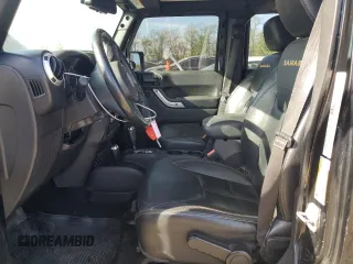 2013 Jeep Wrangler Unlimited Moab with VIN 1C4HJWEG9DL667663, listed as a Copart auction lot 53716105 with 184,885 mi miles and Salvage title. Bid and sale history available at DreamBid. Image 7.