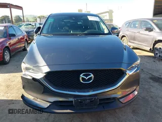 2017 Mazda CX-5 Touring with VIN JM3KFBCL2H0165625, listed as a IAAI auction lot 41879145 with 64,745 mi miles. Bid and sale history available at carsss.com. Image 12.