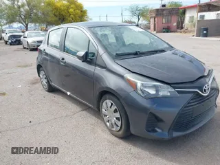 2016 Toyota Yaris L with VIN VNKKTUD3XGA063324, listed as a IAAI auction lot 41478631 with 74,639 mi miles. Bid and sale history available at carsss.com. Image 1.