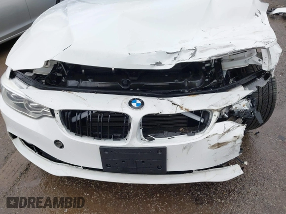 2014 BMW 4 Series 428i with VIN WBA3N3C58EF712202, listed as a IAAI auction lot 41843517 with 90,958 mi miles and . Bid and sale history available at DreamBid. Image 19.