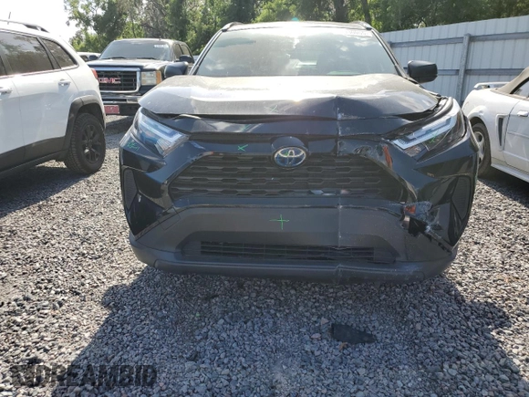 2023 Toyota RAV4 Hybrid LE with VIN JTMLWRFV7PD204946, listed as a Copart auction lot 51330055 with 10,560 mi miles and Salvage Title. Bid and sale history available at carsss.com. Image 5.