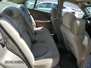 2003 Pontiac Bonneville SE z VIN 1G2HX52KX34177635, wystawiony jako Copart lot #60222734 z przebiegiem 303 653 mil mil oraz Szkoda całkowita • Salvage title. Historia ofert i sprzedaży dostępna na DreamBid. Obrazek 10.