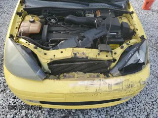 2004 Ford Focus ZX5 z VIN 3FAFP37344R117096, wystawiony jako Copart lot #82789344 z przebiegiem 188 029 mil mil oraz Szkoda całkowita • Salvage title. Historia ofert i sprzedaży dostępna na DreamBid. Obrazek 11.