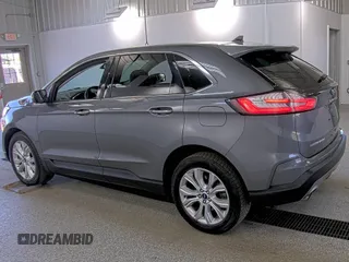 2021 Ford Edge Titanium z VIN 2FMPK4K90MBA53549, wystawiony jako IAAI lot #42254871 z przebiegiem 110 511 mil mil oraz . Historia ofert i sprzedaży dostępna na DreamBid. Obrazek 1.