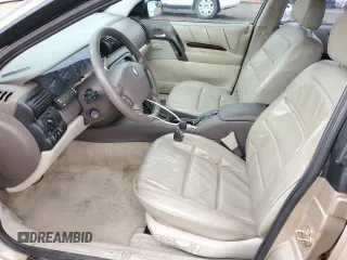 1998 Cadillac Catera z VIN W06VR52R5WR028774, wystawiony jako Copart lot #78085484 z przebiegiem 104 609 mil mil oraz Szkody całkowita. Historia ofert i sprzedaży dostępna na DreamBid. Obrazek 7.