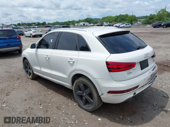 2015 Audi Q3 Premium Plus z VIN WA1EFCFS8FR001278, wystawiony jako IAAI lot #42475043 z przebiegiem 125 417 mil mil oraz . Historia ofert i sprzedaży dostępna na DreamBid. Obrazek 3.