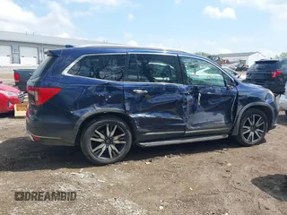 2019 Honda Pilot Touring 7-Passenger z VIN 5FNYF6H63KB000365, wystawiony jako IAAI lot #42154822 z przebiegiem 238 032 mil mil oraz . Historia ofert i sprzedaży dostępna na DreamBid. Obrazek 14.