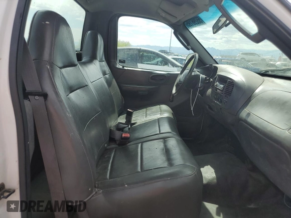 2004 Ford F-150 XL with VIN 2FTRF17294CA59985, listed as a Copart auction lot 55296195 with 220,933 mi miles and Salvage title. Bid and sale history available at DreamBid. Image 10.