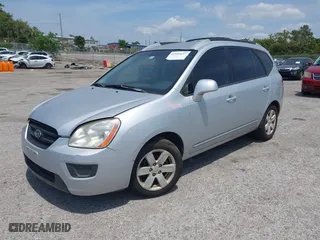 2007 Kia Rondo LX with VIN KNAFG525777087180, listed as a IAAI auction lot 42094657 with 125,256 mi miles. Bid and sale history available at carsss.com. Image 2.