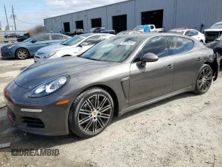 2016 Porsche Panamera 4 z VIN WP0AA2A77GL002362, wystawiony jako Copart lot #46124245 z przebiegiem 71 303 mil mil oraz Szkody całkowita. Historia ofert i sprzedaży dostępna na DreamBid. Obrazek 1.