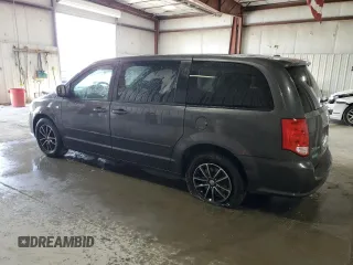 2014 Dodge Grand Caravan SE with VIN 2C4RDGBG6ER463529, listed as a Copart auction lot 51830695 with 105,675 mi miles and Salvage Title. Bid and sale history available at DreamBid. Image 2.