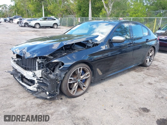 2019 BMW 5 Series M550i xDrive with VIN WBAJB9C51KB289355, listed as a IAAI auction lot 41867984 with 30,106 mi miles and . Bid and sale history available at DreamBid. Image 2.