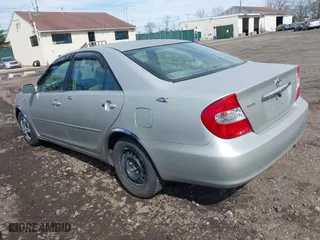 2003 Toyota Camry LE with VIN 4T1BE32K33U726440, listed as a IAAI auction lot 41831850 with 999,999 mi miles. Bid and sale history available at carsss.com. Image 3.