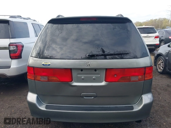 2000 Honda Odyssey EX with VIN 2HKRL1864YH596967, listed as a IAAI auction lot 41976363 with 146,411 mi miles and . Bid and sale history available at DreamBid. Image 16.