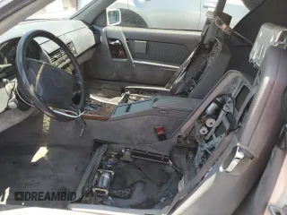 1994 Mercedes-Benz SL z VIN WDBFA63EXRF097007, wystawiony jako Copart lot #59714045 z przebiegiem Nie podano mil oraz Szkoda całkowita • Salvage title. Historia ofert i sprzedaży dostępna na DreamBid. Obrazek 7.