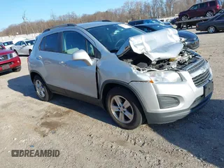 2016 Chevrolet Trax LT z VIN 3GNCJLSB7GL162268, wystawiony jako IAAI lot #41753118 z przebiegiem 123 599 mil mil oraz . Historia ofert i sprzedaży dostępna na DreamBid. Obrazek 1.