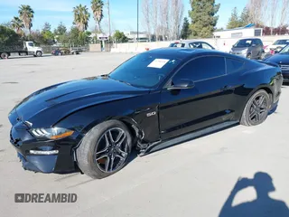 2021 Ford Mustang GT z VIN 1FA6P8CF6M5149175, wystawiony jako IAAI lot #41798328 z przebiegiem 61 776 mil mil oraz . Historia ofert i sprzedaży dostępna na DreamBid. Obrazek 17.