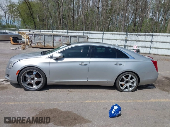 2013 Cadillac XTS Luxury z VIN 2G61P5S3XD9178601, wystawiony jako IAAI lot #42154859 z przebiegiem 111 227 mil mil oraz . Historia ofert i sprzedaży dostępna na DreamBid. Obrazek 14.
