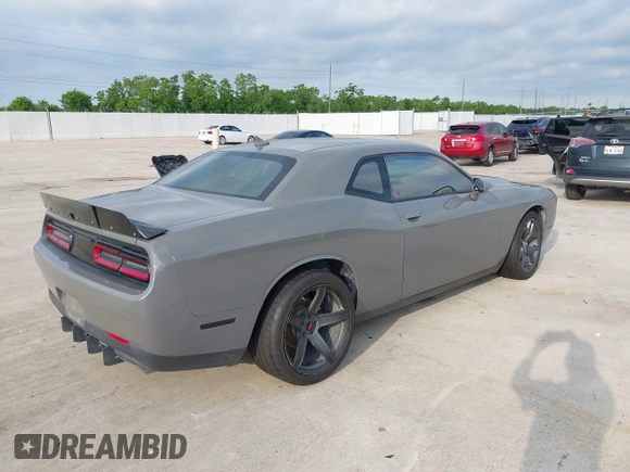 2017 Dodge Challenger R/T with VIN 2C3CDZBT8HH666130, listed as a IAAI auction lot 42173702 with 94,857 mi miles and . Bid and sale history available at DreamBid. Image 4.