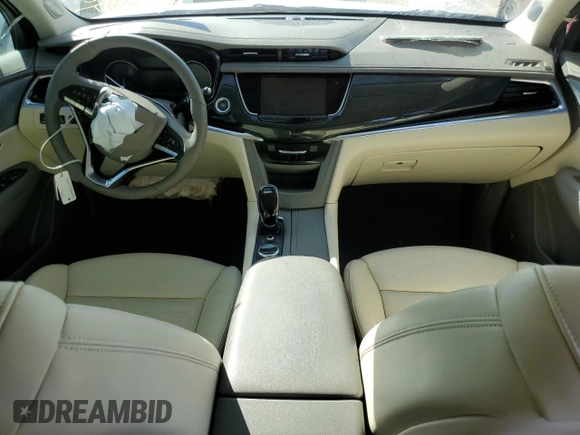 2024 Cadillac XT6 FWD Premium Luxury with VIN 1GYKPCRS1RZ700963, listed as a Copart auction lot 49031094 with 2,977 mi miles and Salvage Title. Bid and sale history available at carsss.com. Image 8.