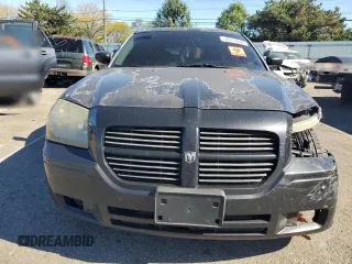 2005 Dodge Magnum SE z VIN 2D4FV48V55H533891, wystawiony jako Copart lot #74751644 z przebiegiem 287 869 mil mil oraz Szkoda całkowita • Salvage title. Historia ofert i sprzedaży dostępna na DreamBid. Obrazek 5.