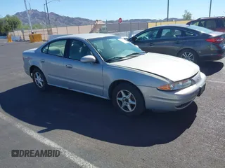 2000 Oldsmobile Alero GL2 z VIN 1G3NL52T6YC434404, wystawiony jako IAAI lot #42488982 z przebiegiem 110 828 mil mil oraz . Historia ofert i sprzedaży dostępna na DreamBid. Obrazek 1.