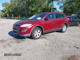 2011 Mazda CX-9 Touring with VIN JM3TB2CA6B0328864, listed as a IAAI auction lot 42029203 with 98,022 mi miles and . Bid and sale history available at DreamBid. Image 2.