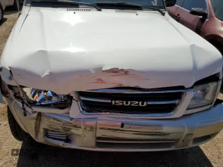 1999 Isuzu Trooper S z VIN JACDJ58X6X7912631, wystawiony jako Copart lot #74153604 z przebiegiem 141 037 mil mil oraz Szkoda całkowita • Salvage title. Historia ofert i sprzedaży dostępna na DreamBid. Obrazek 12.